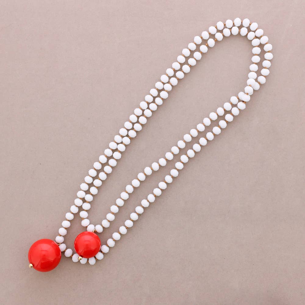 White Long Necklace with Faceted Beads and Orange Double Ball Pendants