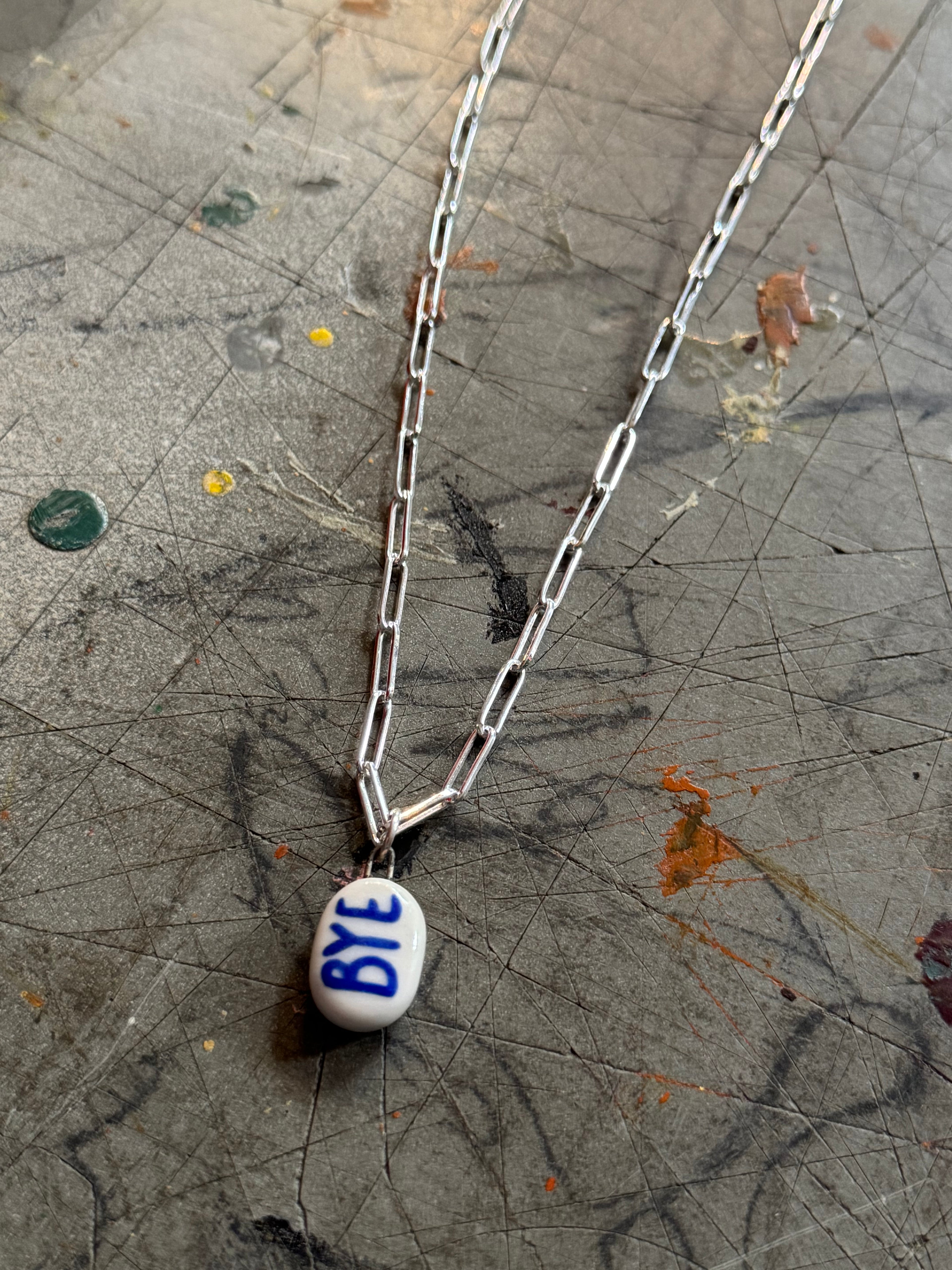 OK Bye Pendant Necklace, handmade in White Porcelain: 18" silver paperclip
