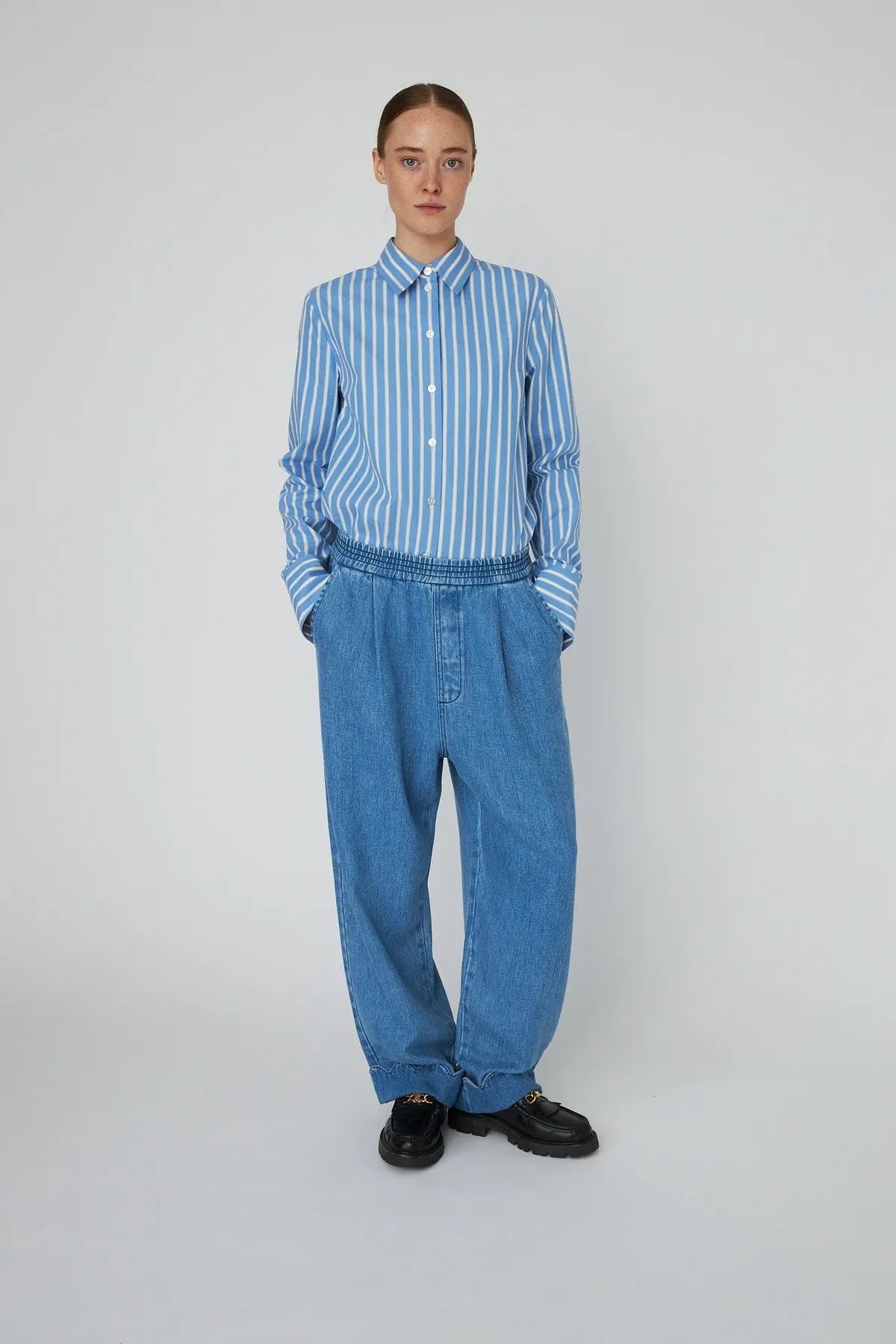 Washed Blue Low Waist Pants with Scallop Edge