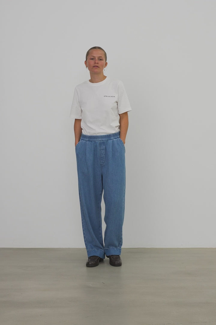 Washed Blue Low Waist Pants with Scallop Edge